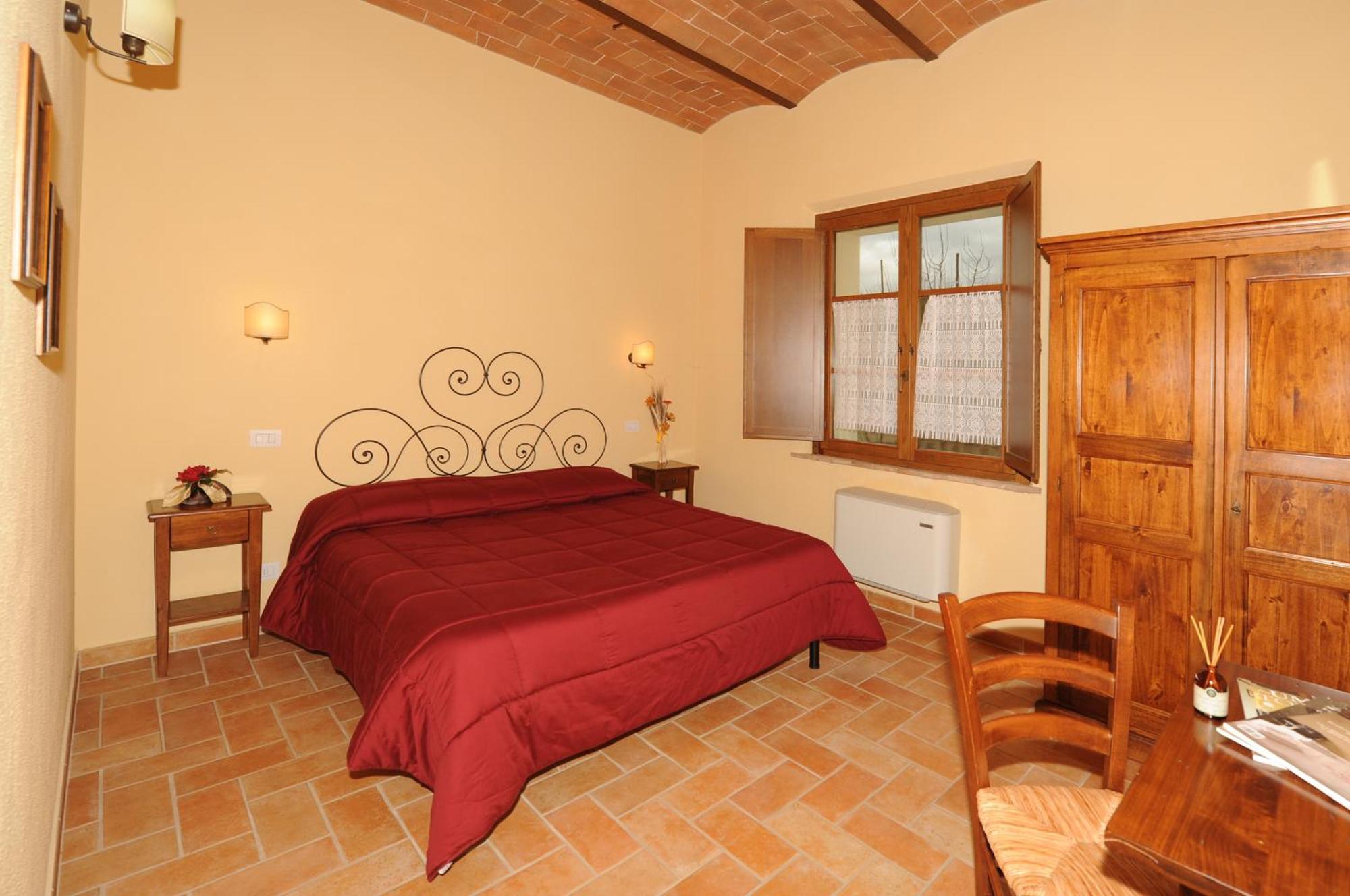 Agriturismo Poggio Tobruk П'єнца Номер фото
