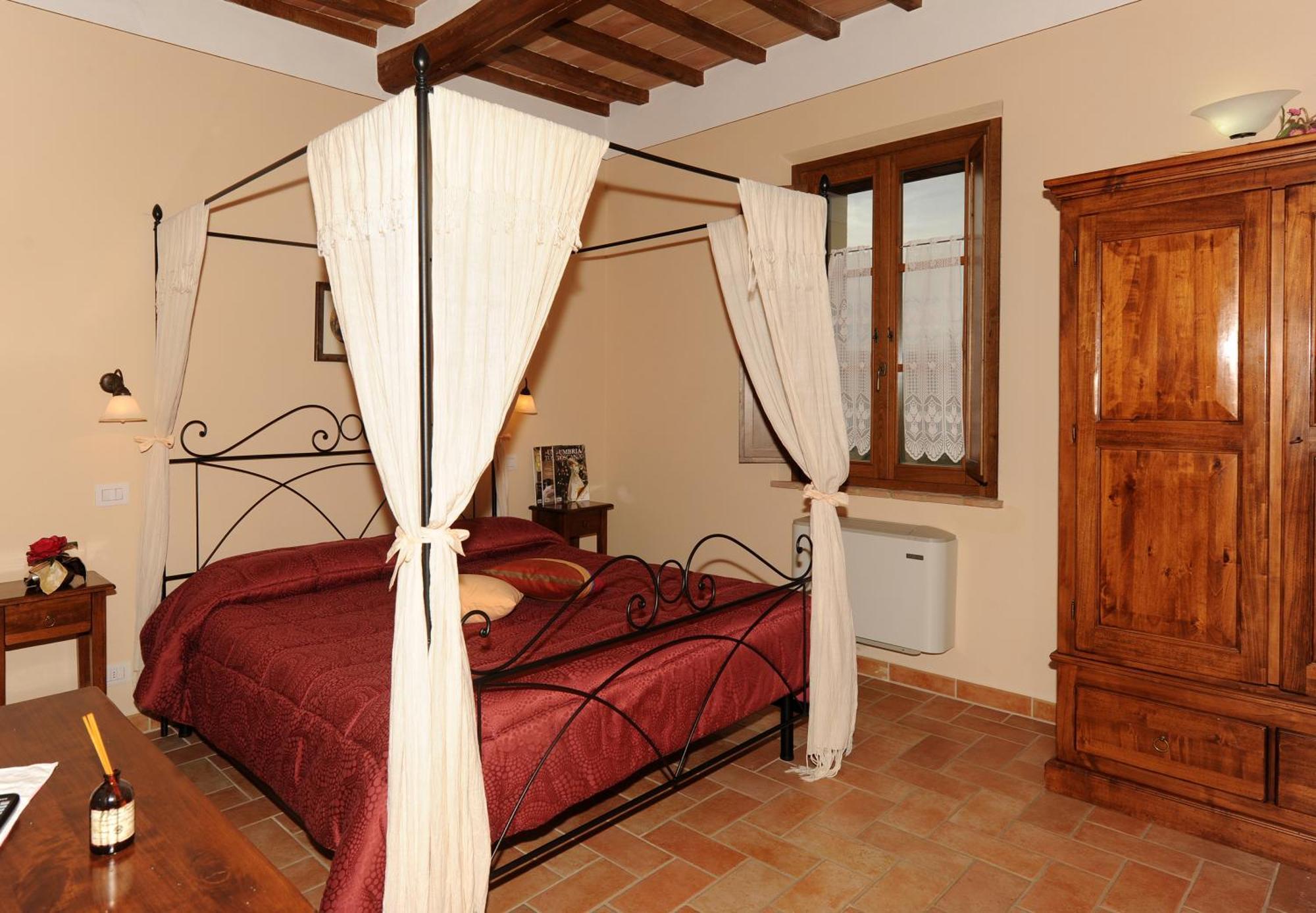 Agriturismo Poggio Tobruk П'єнца Номер фото
