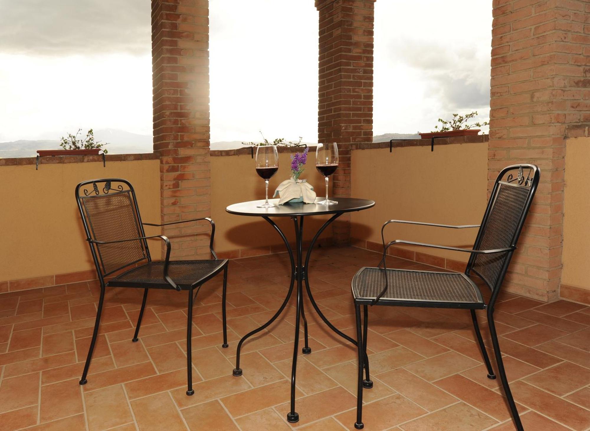 Agriturismo Poggio Tobruk П'єнца Номер фото